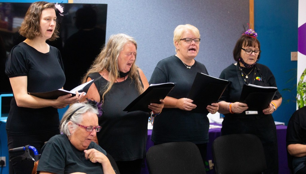 Rose singing in a choir