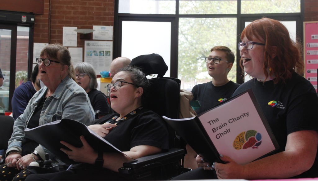 Sophia singing in choir