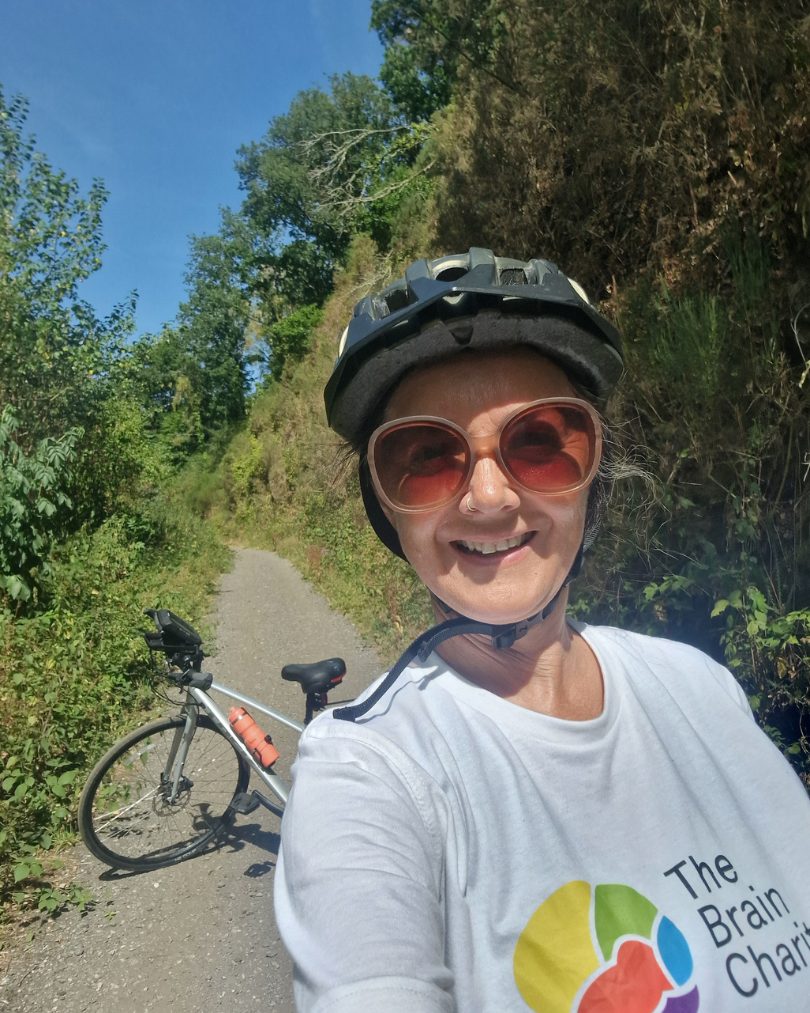 Jenni Reid wearing a The Brain Charity t-shirt